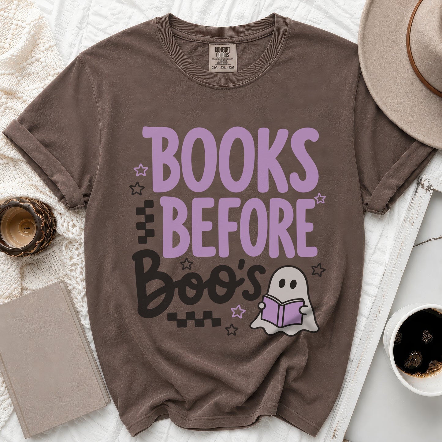 Brown t-shirt with purple "BOOKS BEFORE Boo's" text and a ghost reading a book.