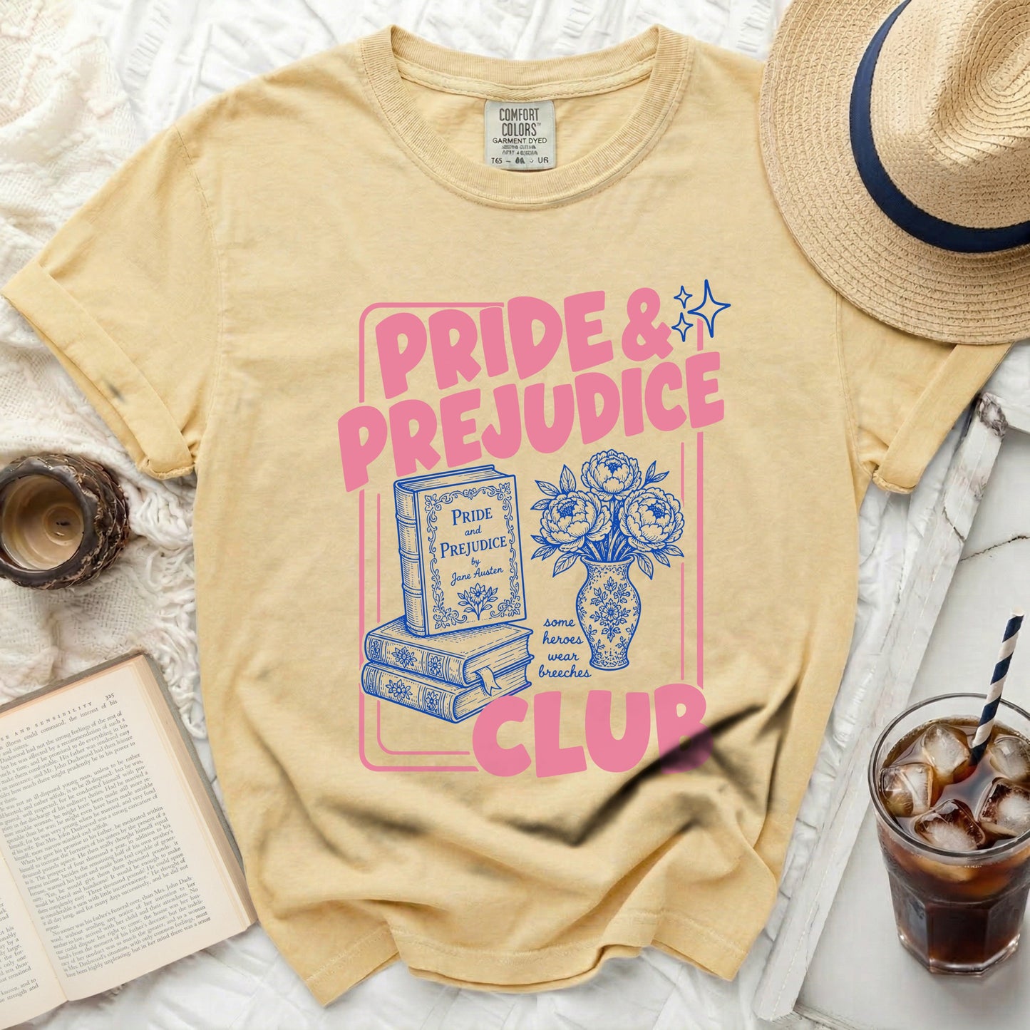 Yellow t-shirt with "Pride & Prejudice Club" graphic and book illustration.