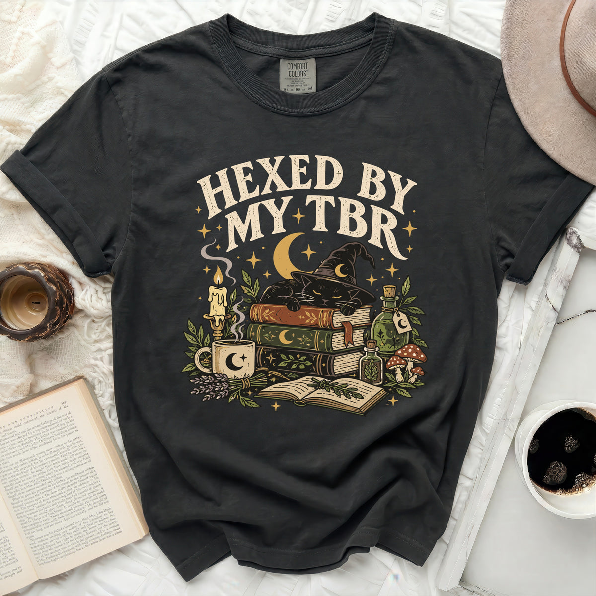Black t-shirt with "Hexed by My TBR" graphic featuring a cat and books.