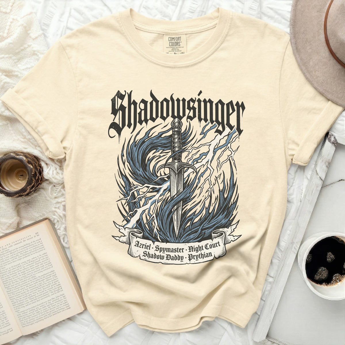 Cream Comfort Colors t-shirt with sword, flames, lightning, and text Shadowsinger.