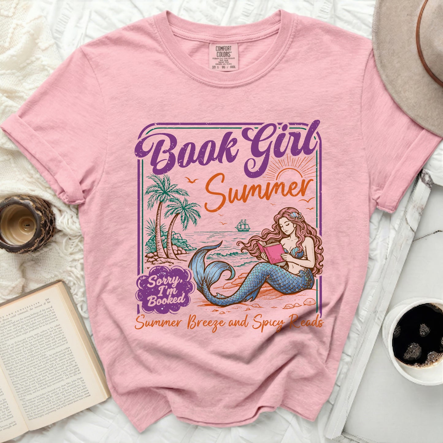 Pink t-shirt with "Book Girl Summer" and a mermaid reading a book.