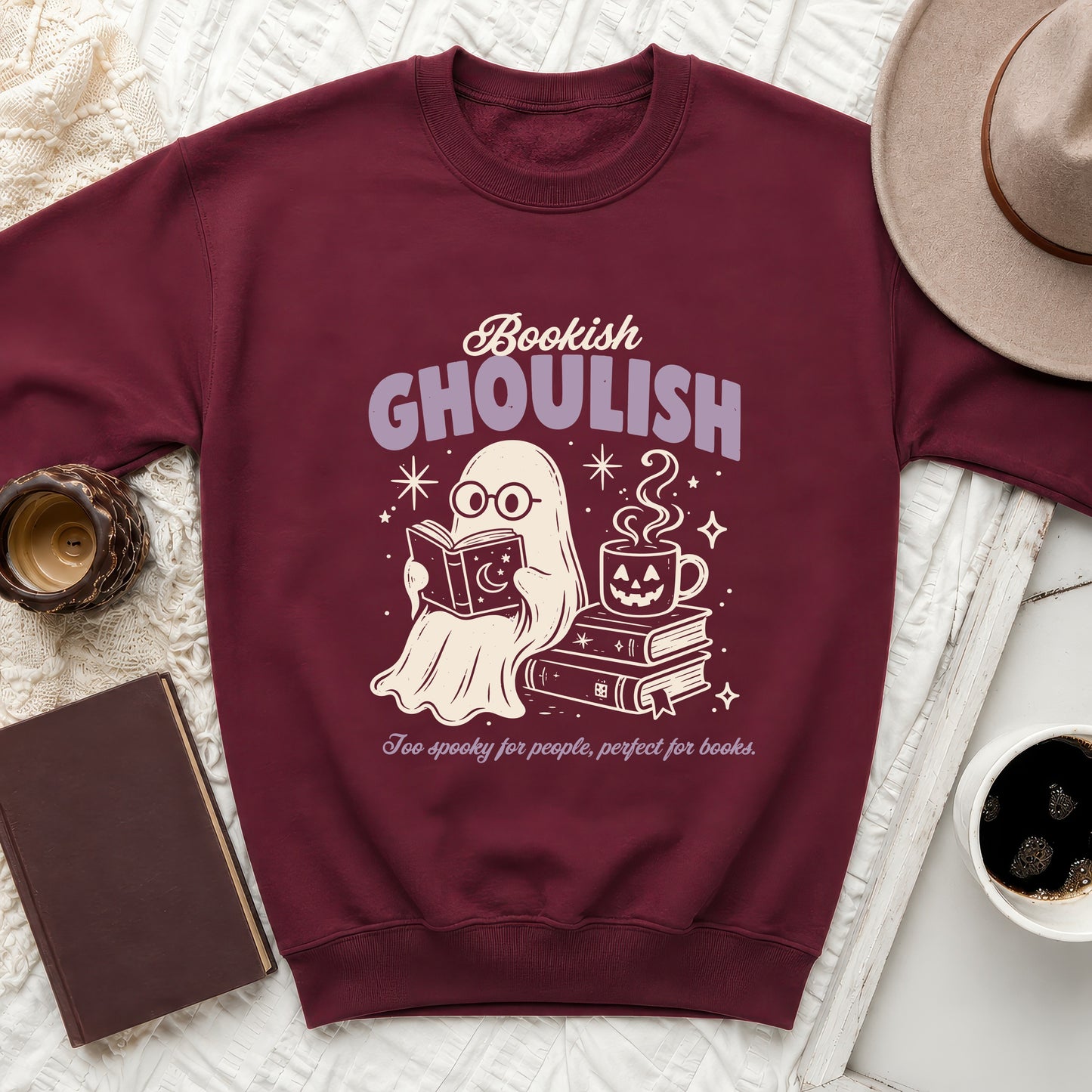 Maroon sweatshirt with 'Bookish GhoulIsh' text and a ghost reading.