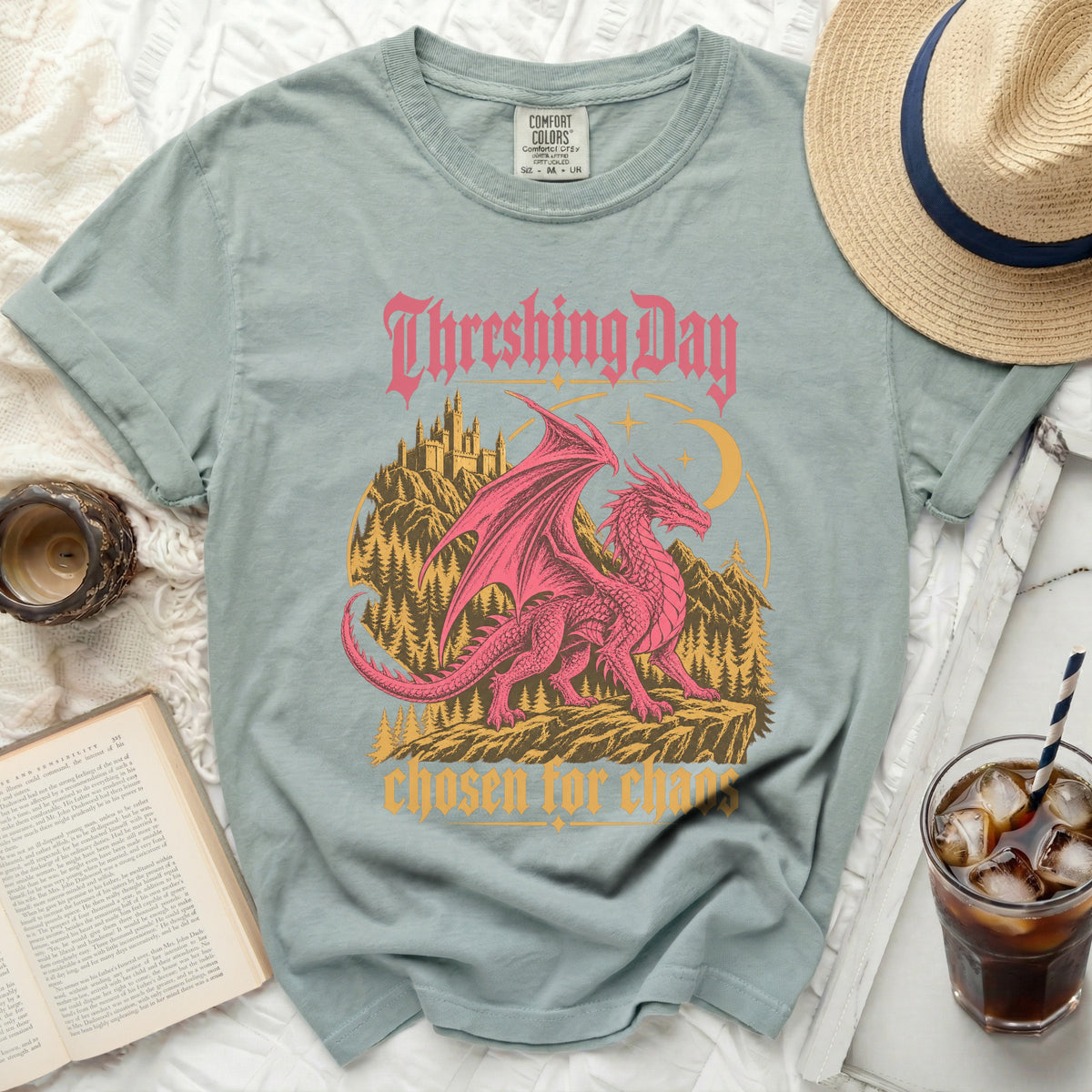 "Threshing Day Chosen for Chaos" graphic tee with a pink dragon and castle.