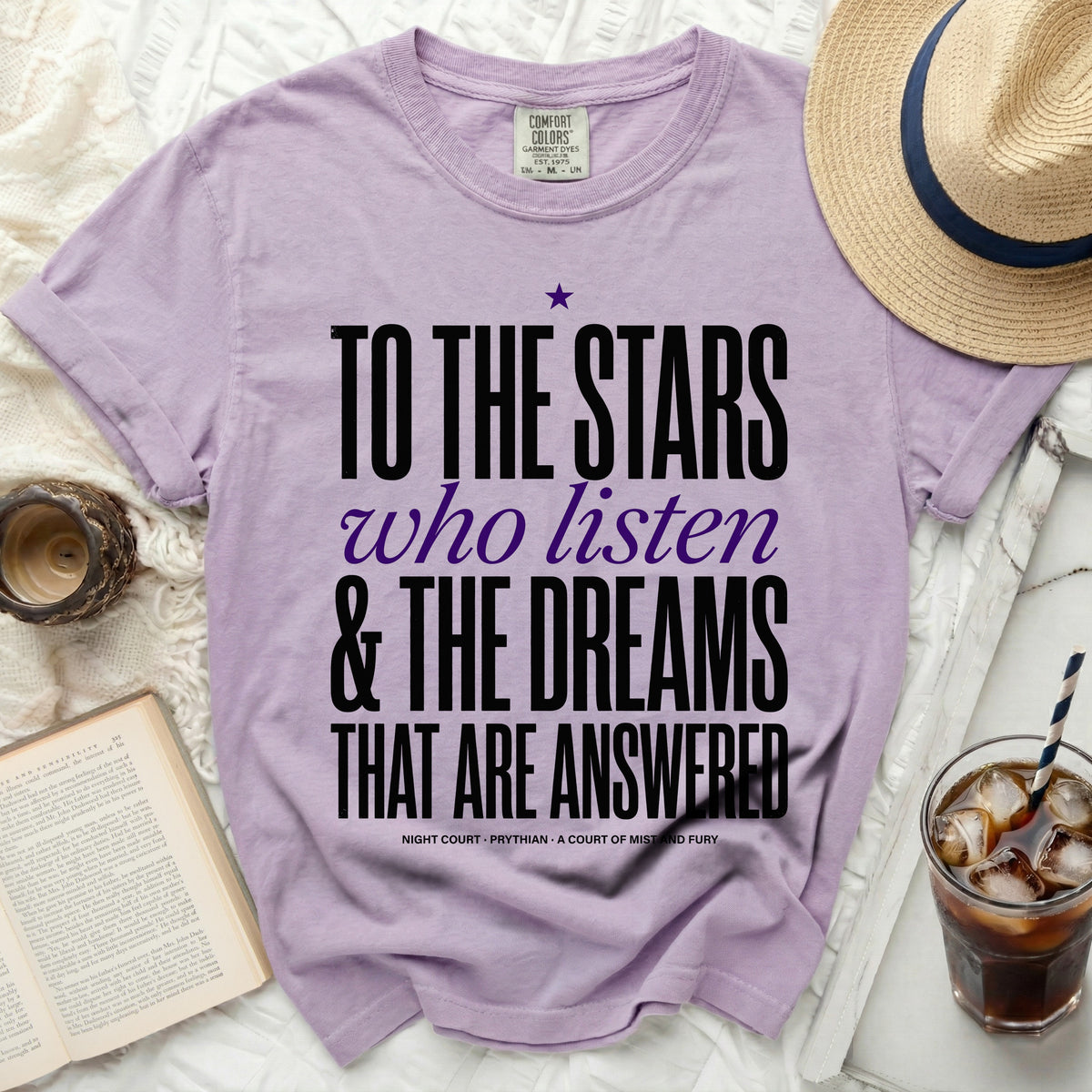 Purple t-shirt with text "To the stars who listen & the dreams that are answered".