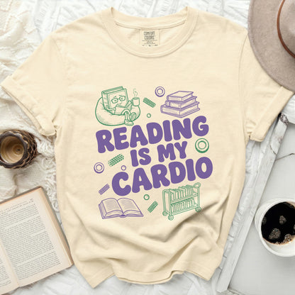 Cream t-shirt with "Reading Is My Cardio" text and book graphics.