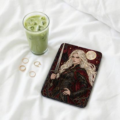 Book cover art of a blonde woman with a sword and a moon.