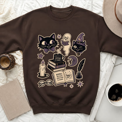 Brown sweatshirt with Halloween-themed graphic art.