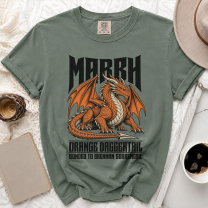 Green t-shirt with "MARCH ORANGE DAGGERTAIL BONDED TO BRENNAN SORRENGAL" and dragon graphic.