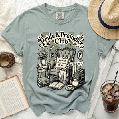 Pride & Prejudice Club graphic on a light green t-shirt.