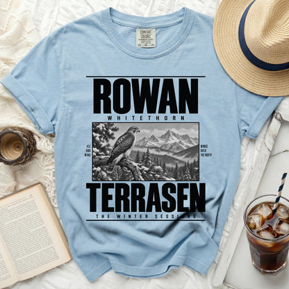 Light blue t-shirt with "ROWAN WHITETHORN TERRASEN THE WINTER SESSIONS" text and hawk illustration.