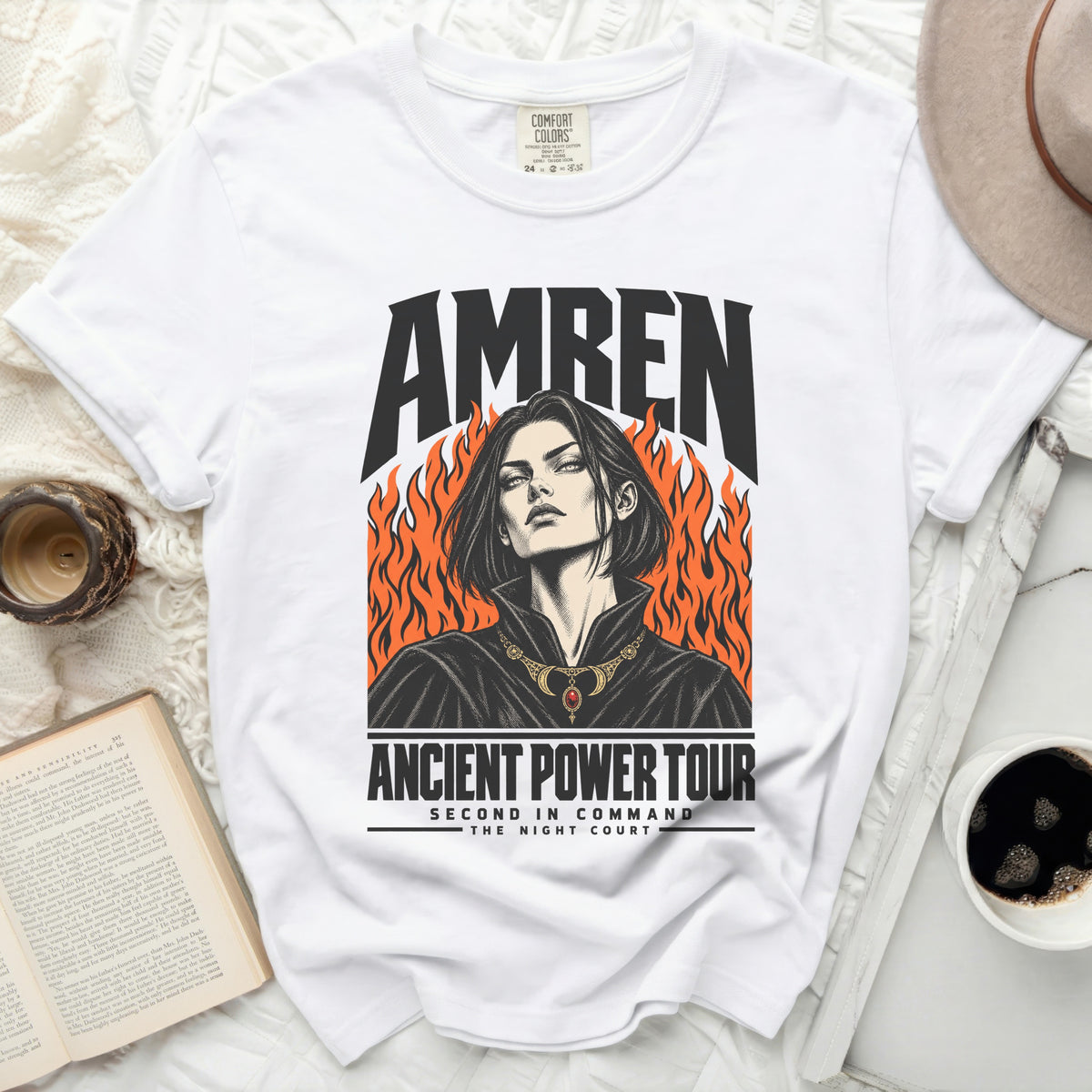 White t-shirt with "AMREN ANCIENT POWER TOUR SECOND IN COMMAND THE NIGHT COURT" graphic.