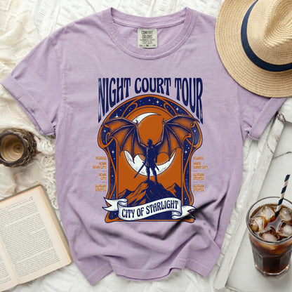 Purple t-shirt with "Night Court Tour City of Starlight" graphic.
