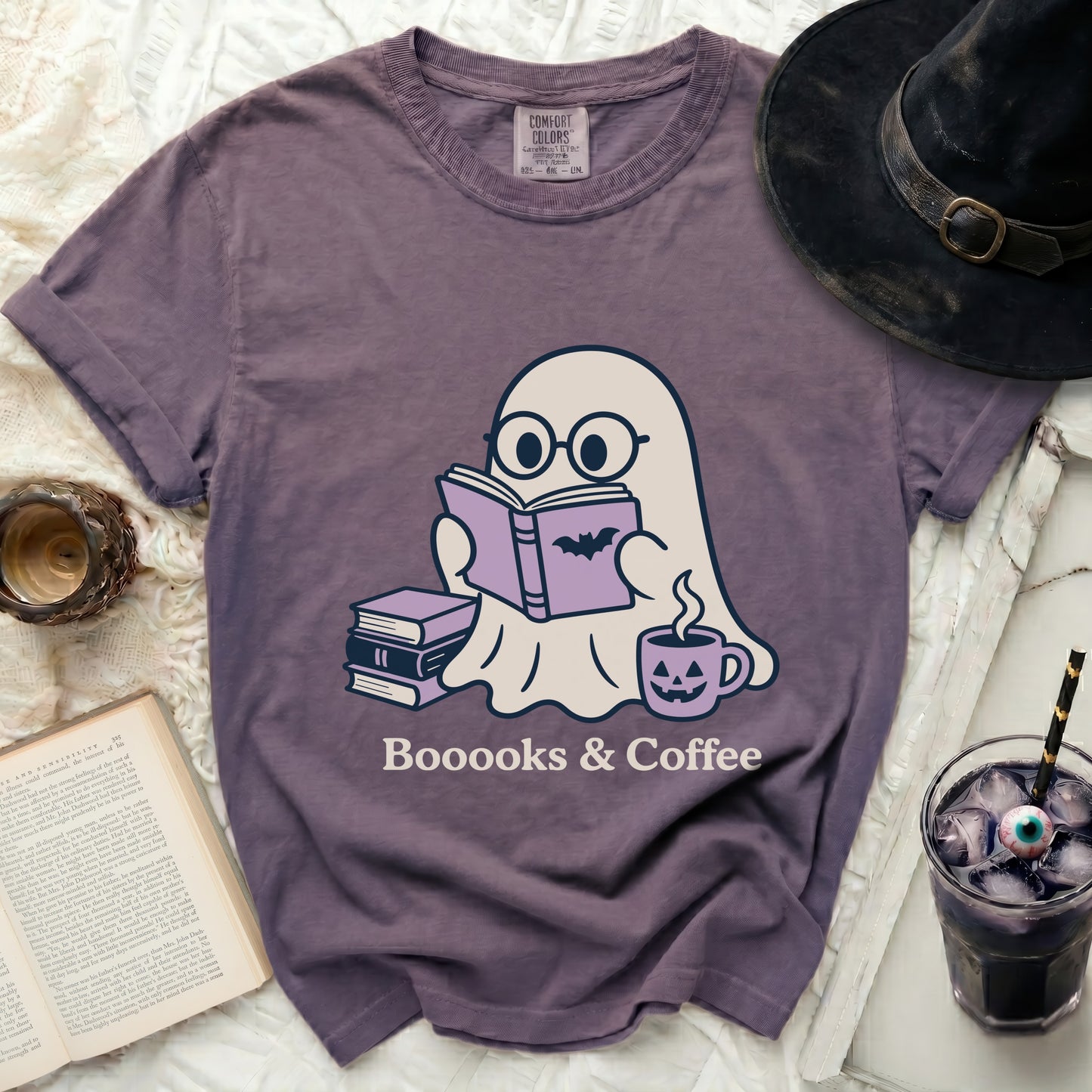Ghost reading a book with coffee, text "Booooks & Coffee".