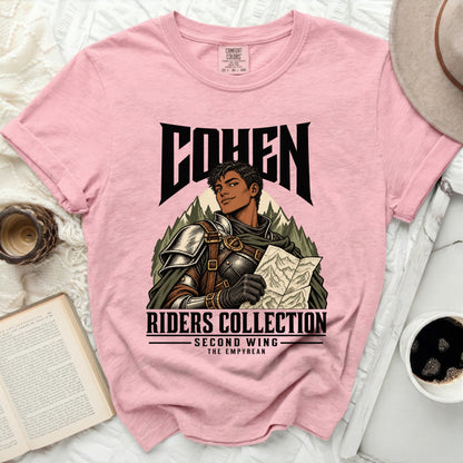 Pink t-shirt with "COHEN RIDERS COLLECTION SECOND WING THE EMPYREAN" text and warrior map graphic.