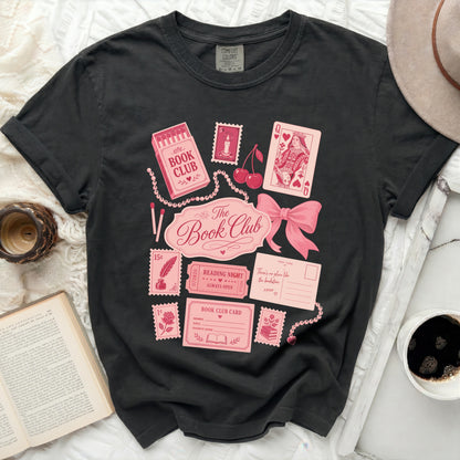 Book Club graphic tee with playing cards, stamps, and a postcard.