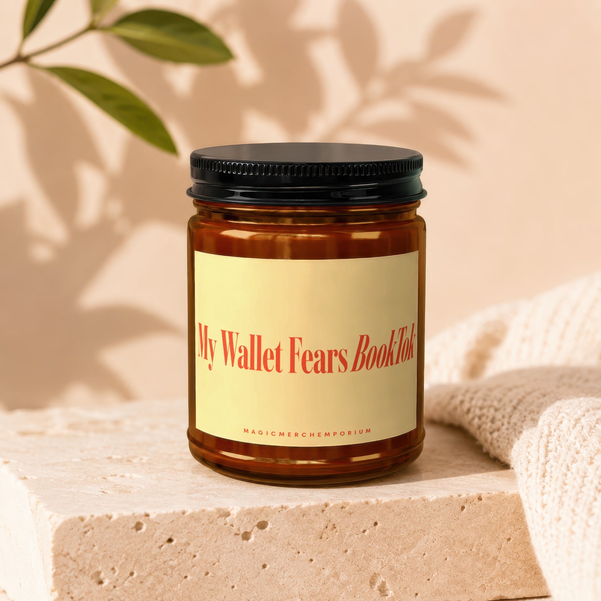 Amber candle with black lid, reads "My Wallet Fears BookTok" and "MAGICMERCHTEMPORIUM".
