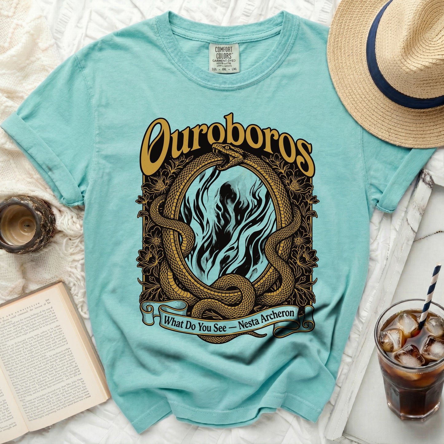 Aqua t-shirt with Ouroboros snakes and "What Do You See Nesta Acheron" text.