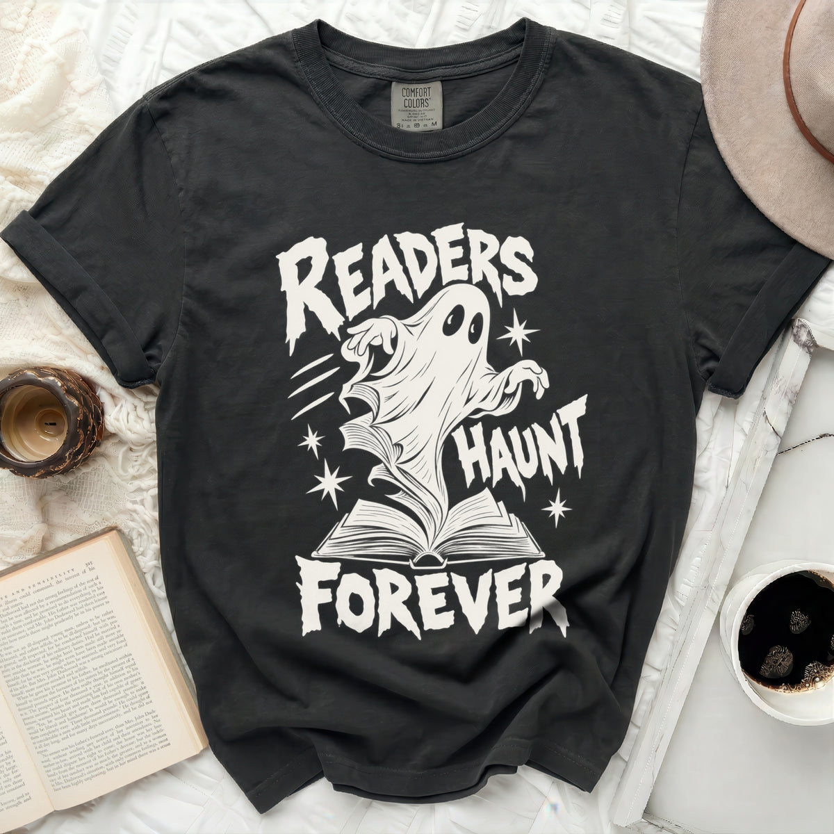 Black t-shirt with white ghost, open book, and "Readers Haunt Forever" text.