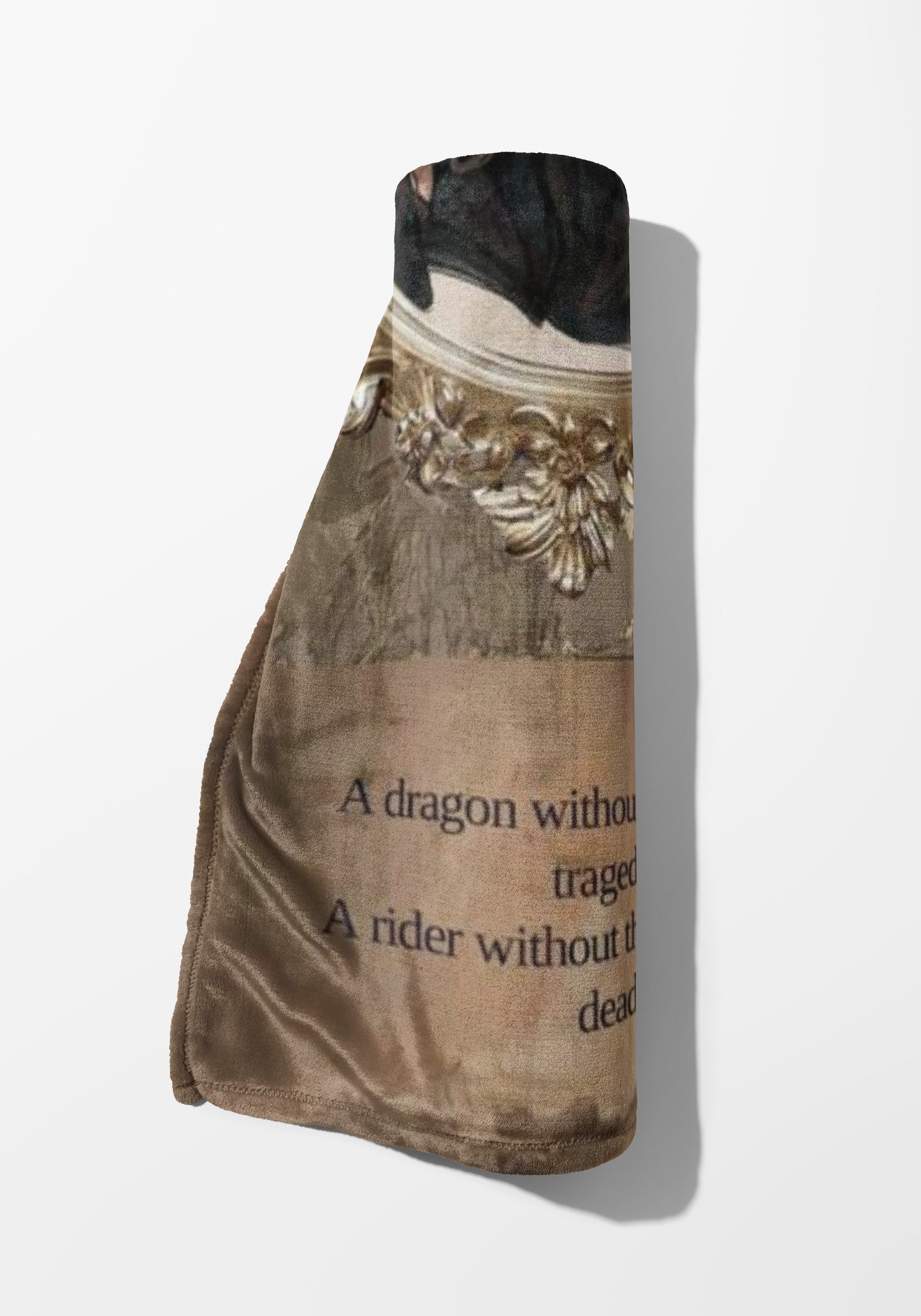 Brown blanket with text: "A dragon without a rider without the dead".