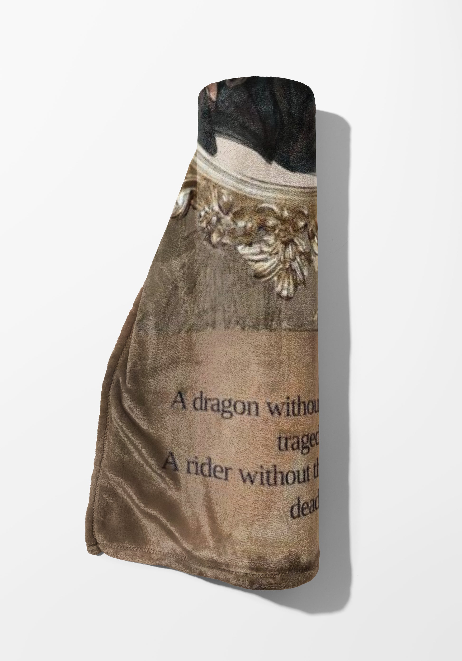 Brown blanket with text: "A dragon without a rider without the dead".