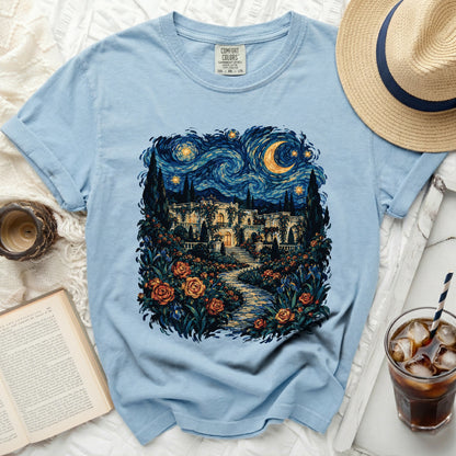 Light blue Comfort Colors t-shirt with starry night landscape print.
