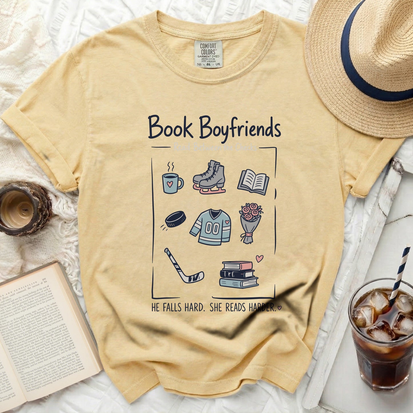Yellow t-shirt with "Book Boyfriends" and reading-themed icons.