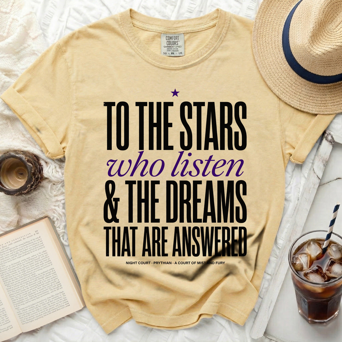 Yellow t-shirt with black text "To the Stars who listen & the Dreams that are Answered."