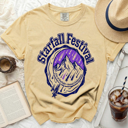 Yellow t-shirt with "Starfall Festival City of Starlight Annual Celebration" graphic.