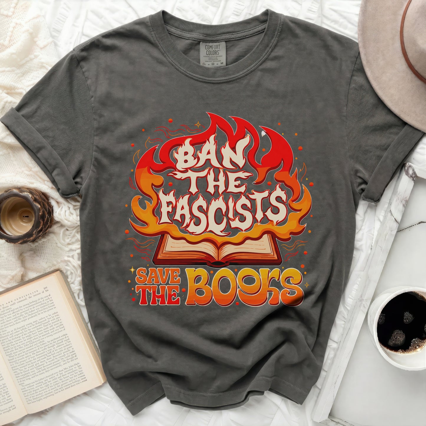 Gray t-shirt with "Ban the Fascists Save the Books" graphic.