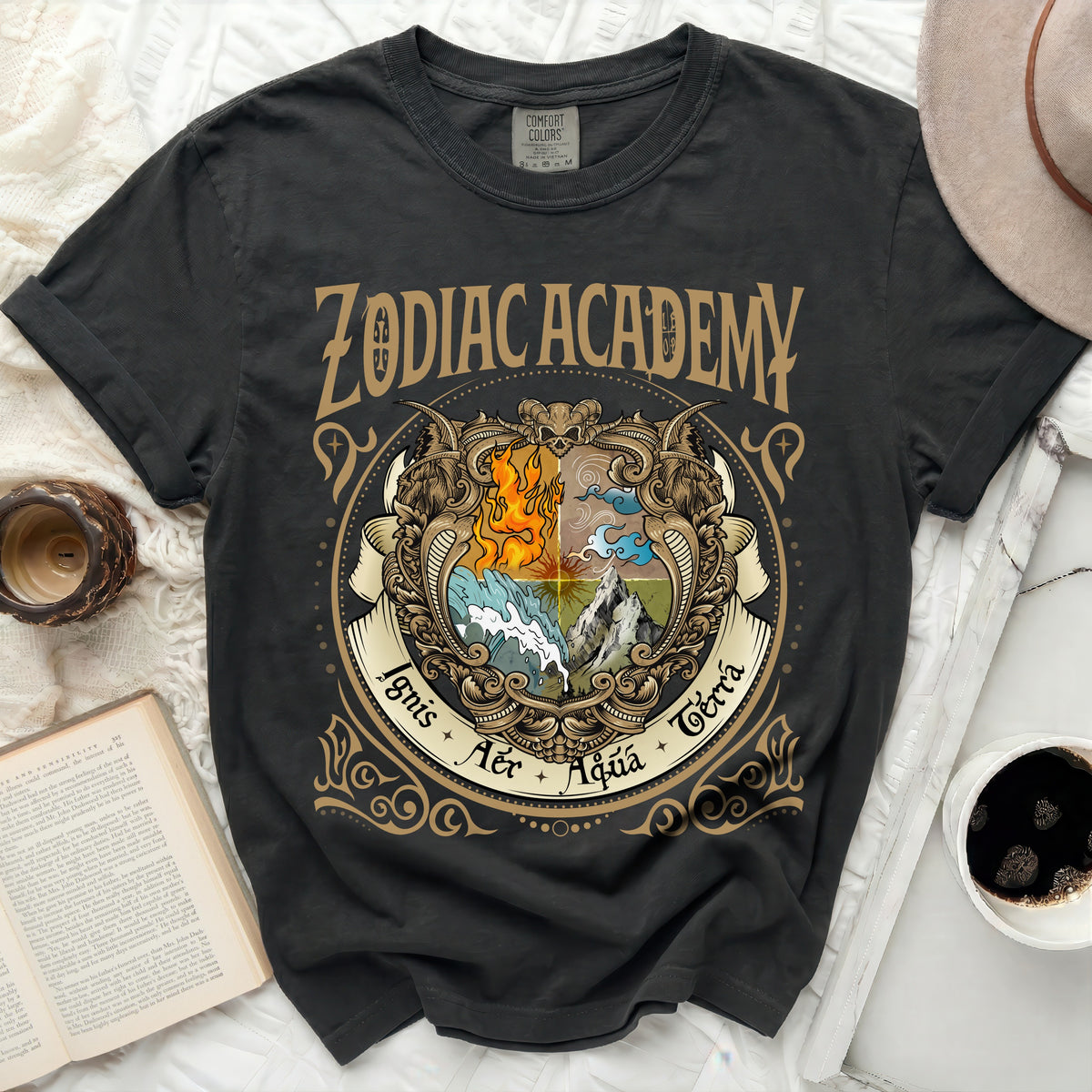 Black t-shirt with "Zodiac Academy" and elemental crest graphic.