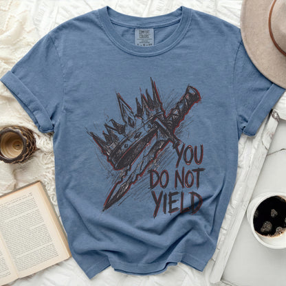 Blue t-shirt with graphic of crown, sword, and text "YOU DO NOT YIELD".