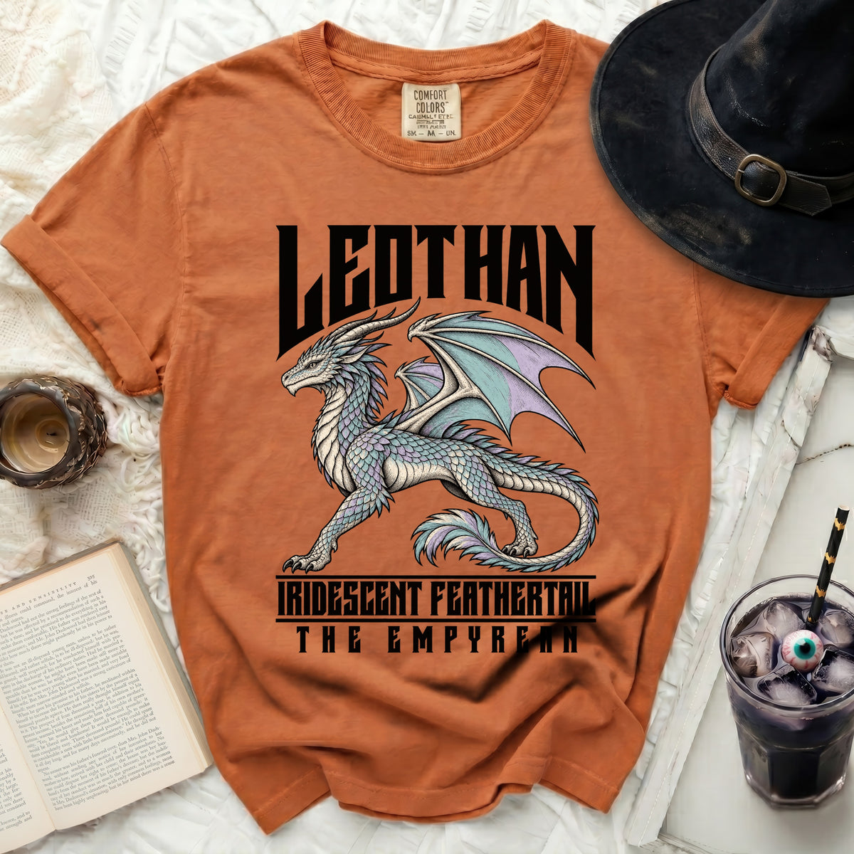Orange t-shirt with a detailed dragon design and "LEDTHAN" text.