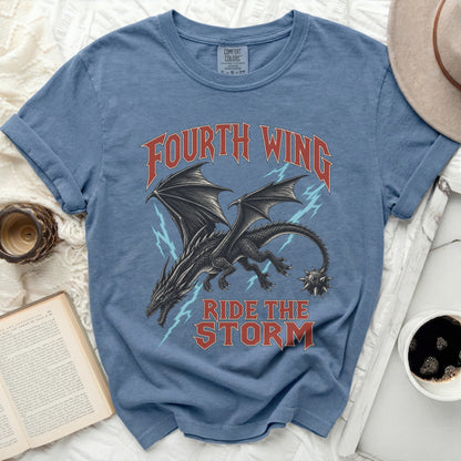 Blue t-shirt with black dragon design and text "Fourth Wing Ride the Storm".
