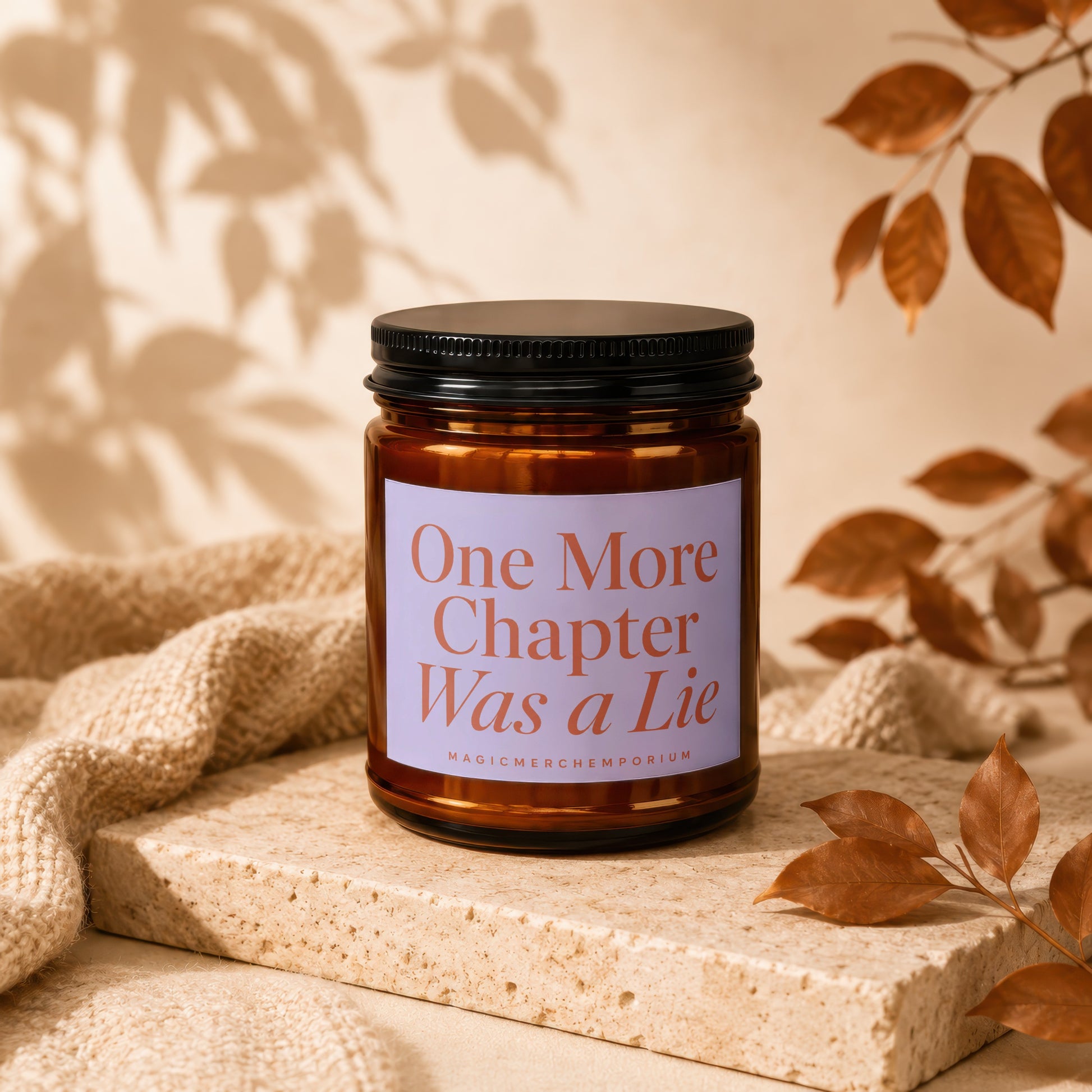 Candle with text "One More Chapter Was a Lie" on a stone pedestal.