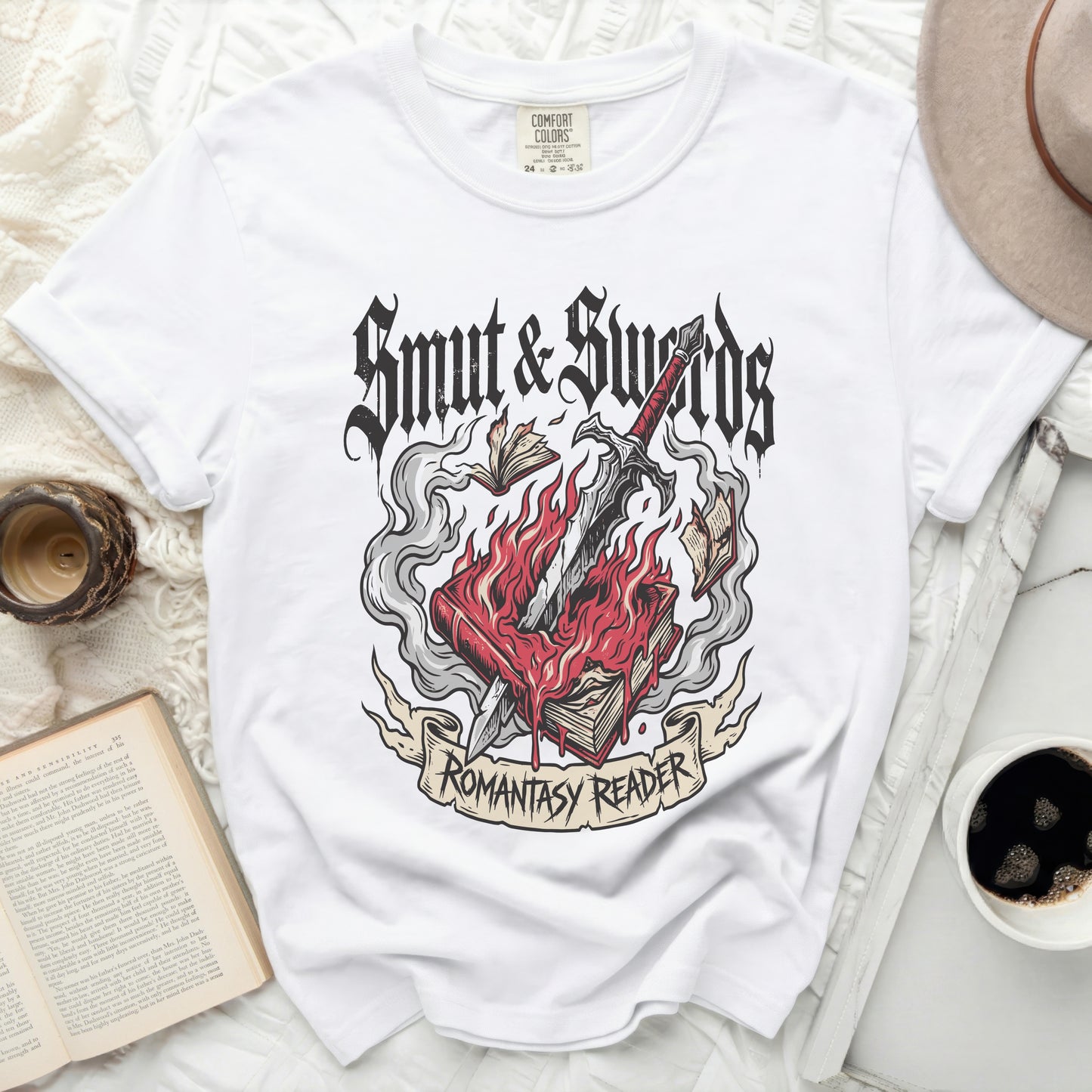 White t-shirt with "Smut & Swords" and "Romantasy Reader" graphic.