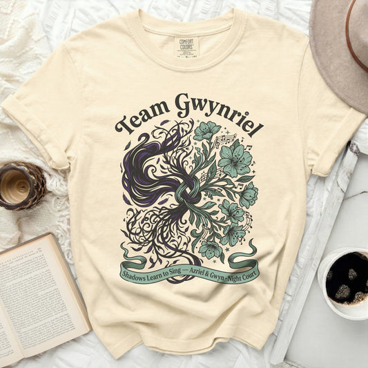Cream t-shirt with "Team Gwynriel" and floral design.