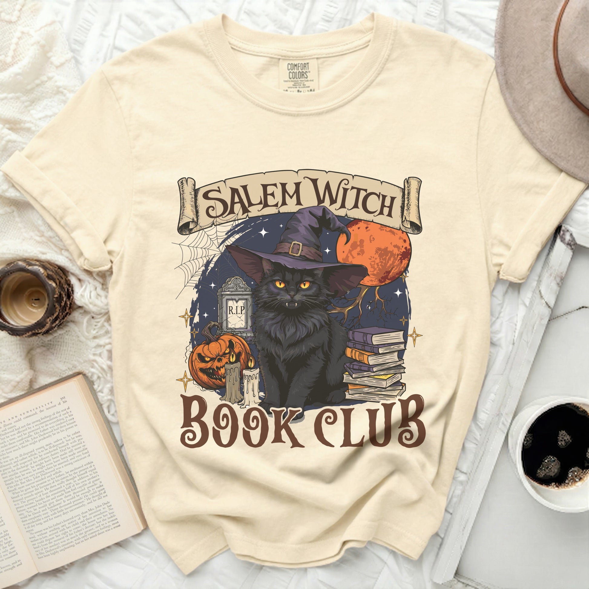 Black cat in witch hat with pumpkin, candles, and books, reading "Salem Witch Book Club."