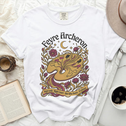 White t-shirt with Feyre Archon design, moon, stars, and floral accents.