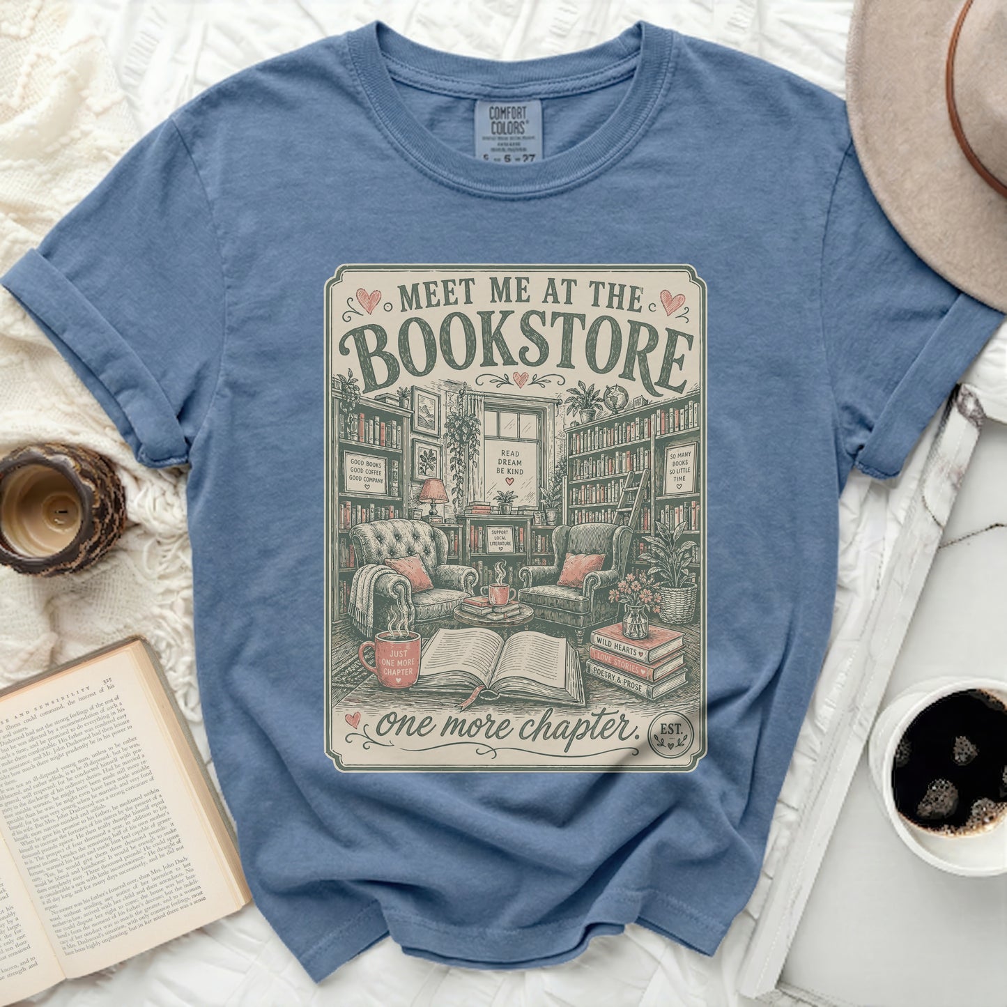 Comfort Colors t-shirt with "Meet Me at the Bookstore" graphic.