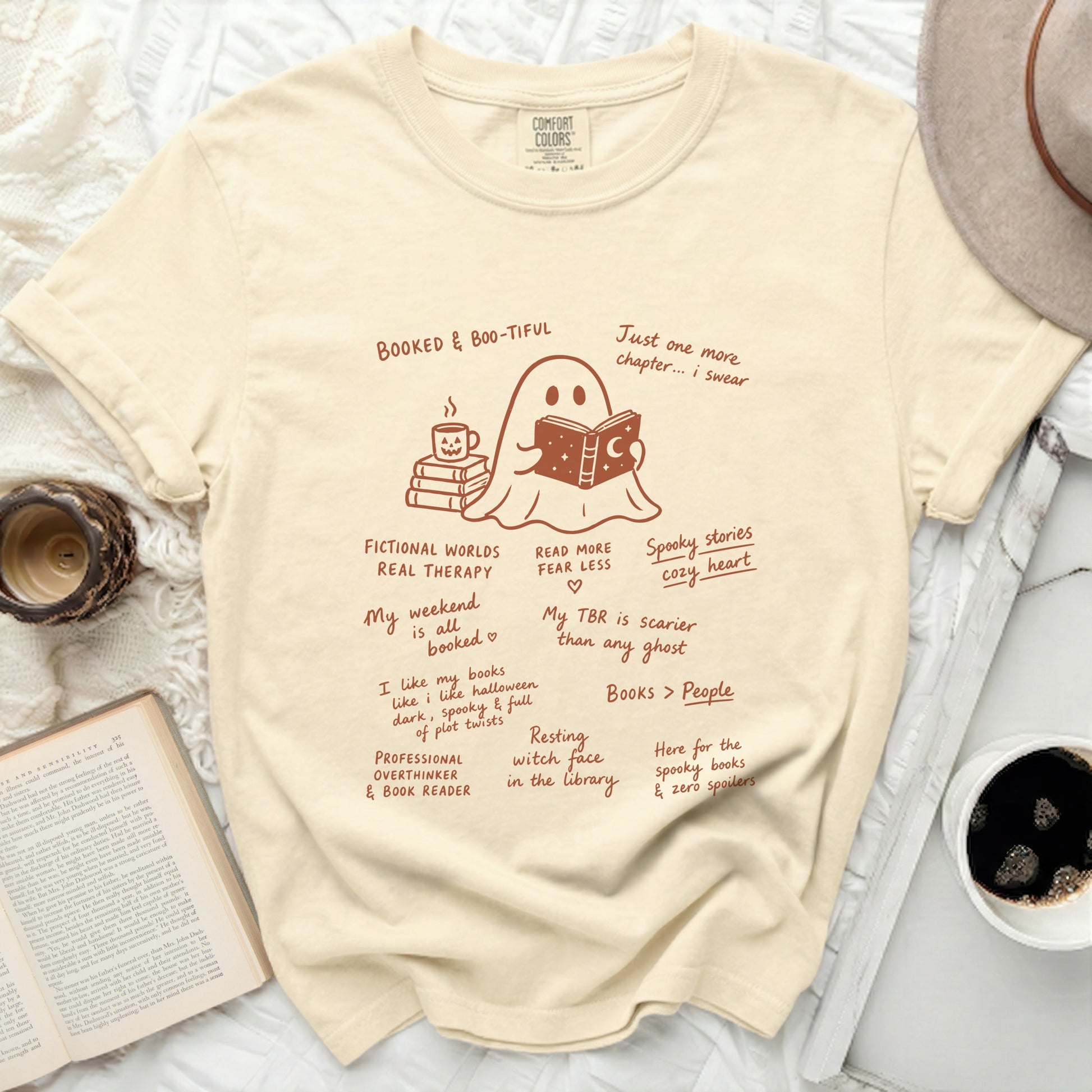 Cream t-shirt with ghost reading, books, coffee, and reading quotes.