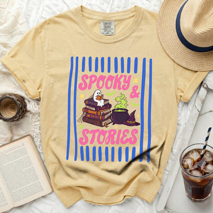 Yellow t-shirt with "Spooky & Stories" Halloween graphic.
