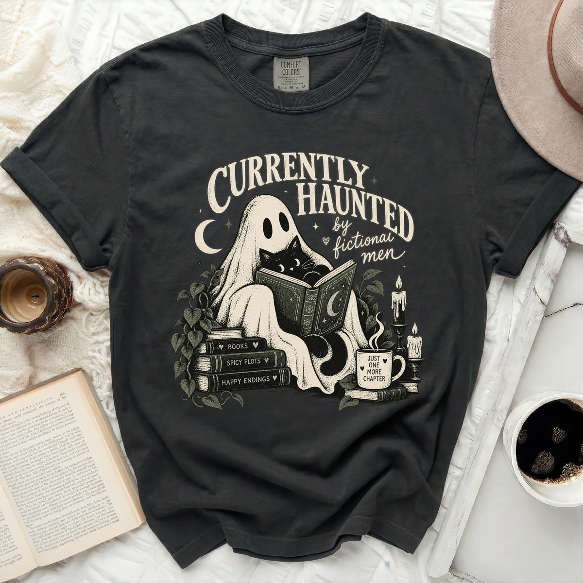 Dark t-shirt with ghost, cat, books, and "Currently Haunted by Fictional Men" text.