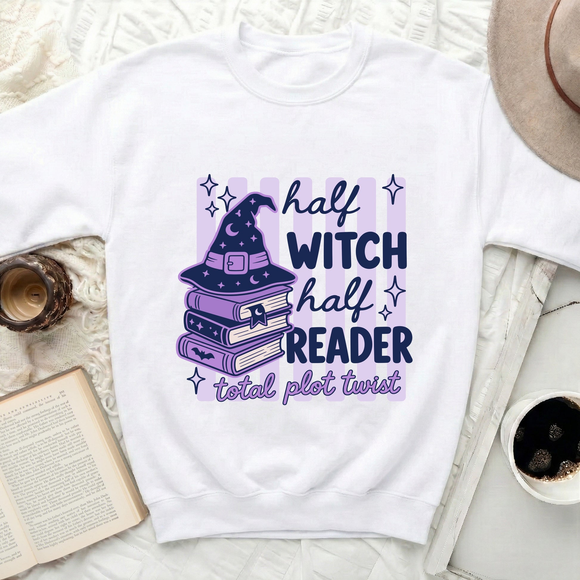 White sweatshirt with "half witch half reader total plot twist" graphic.