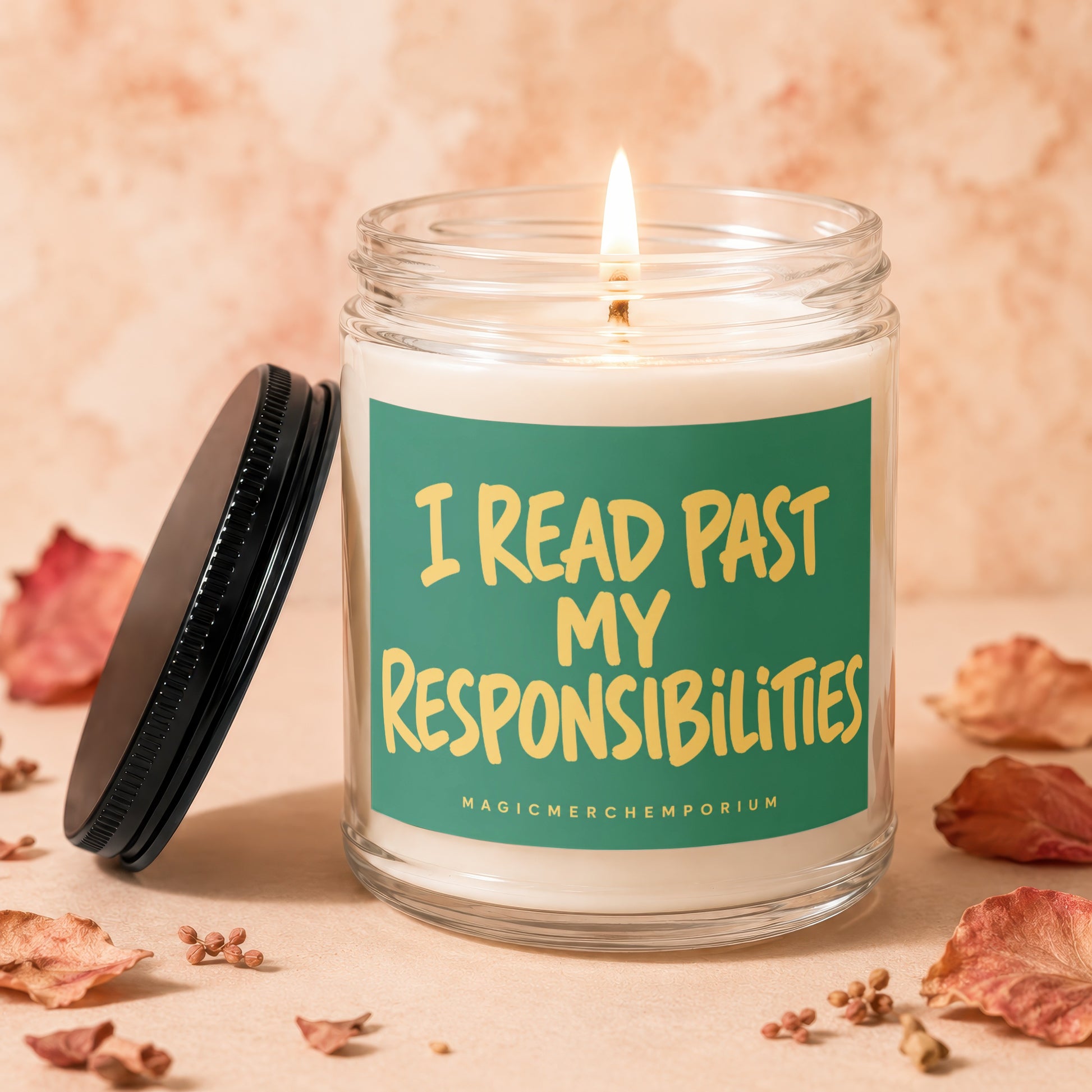 Lit glass jar candle with a white wax fill and a green label reading "I READ PAST MY RESPONSIBILITIES".