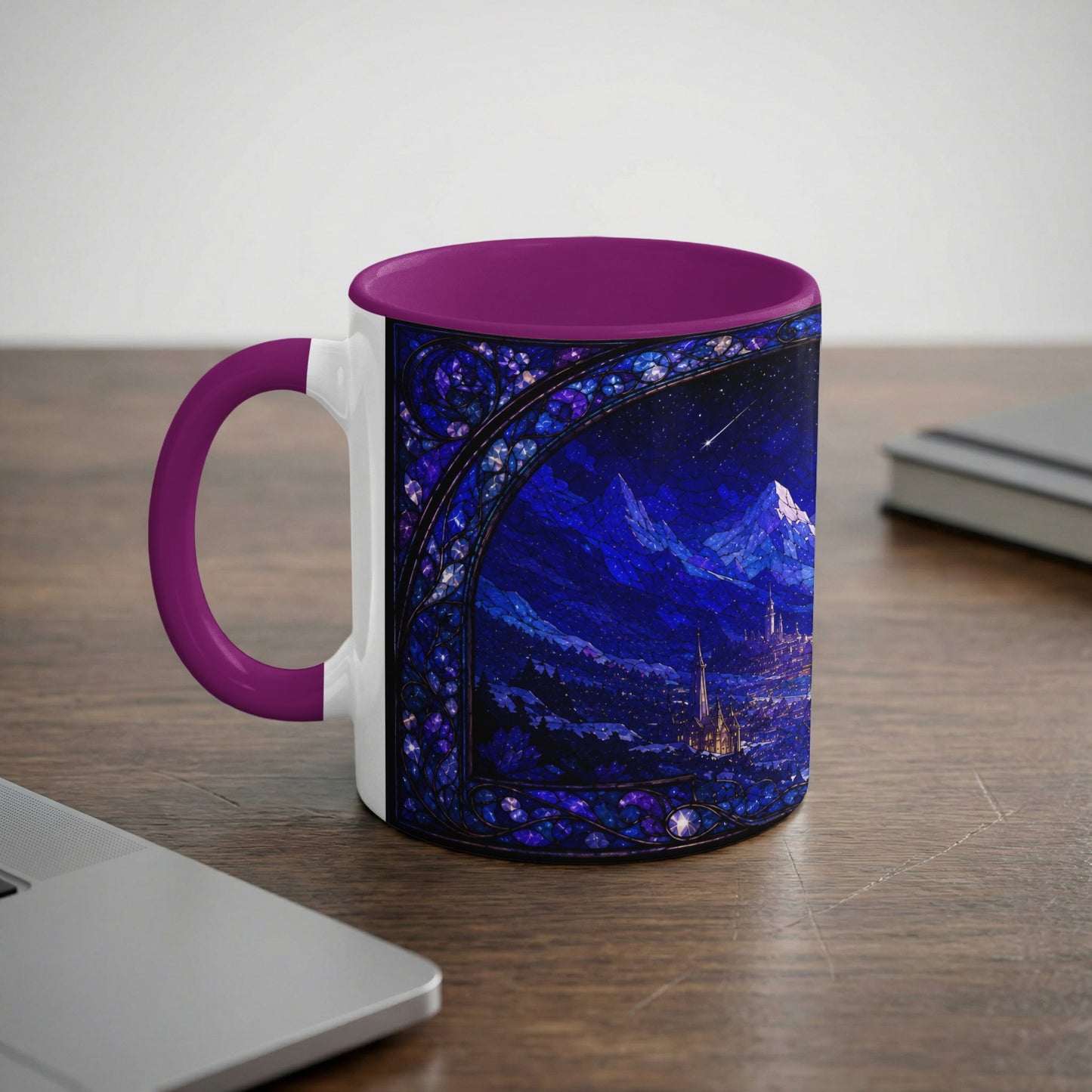 White mug with purple handle featuring a stained-glass nighttime mountain village scene.