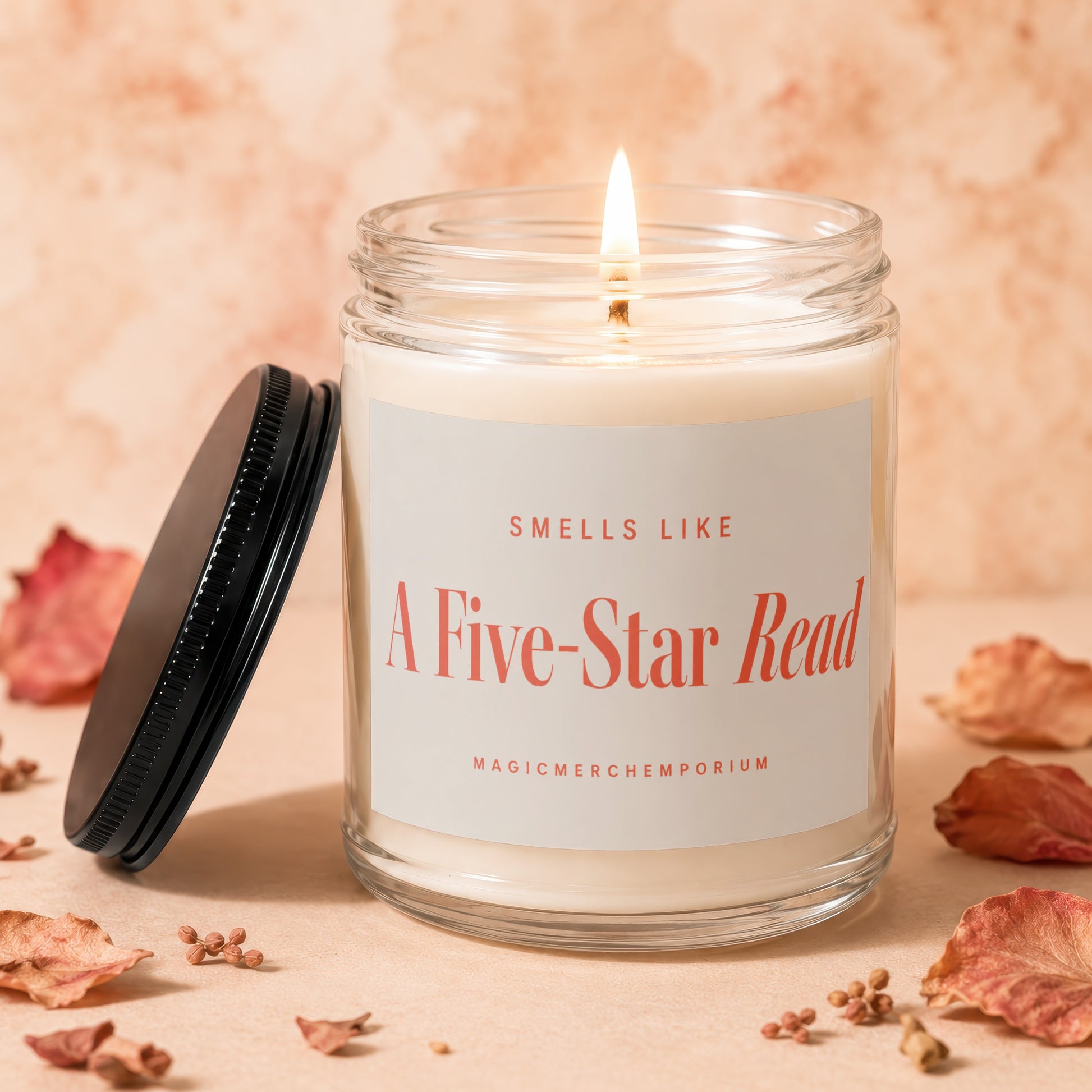 Lit candle in glass jar with "Smells Like A Five-Star Read" label.