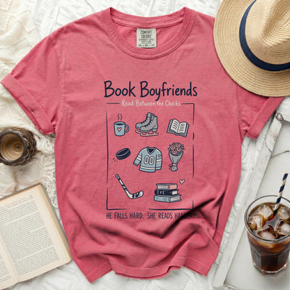 T-shirt with "Book Boyfriends" text and illustrations of bookish items.