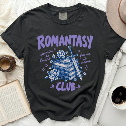 T-shirt with "Romantasy Club" text, sword, books, and roses graphic.
