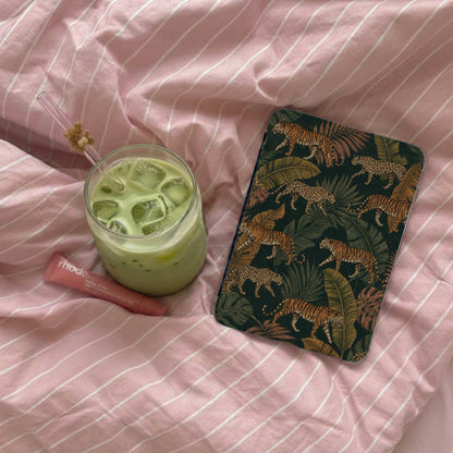 Phone case with tiger and leopard print on dark green background.