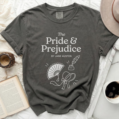 Dark grey t-shirt with "The Pride & Prejudice BY JANE AUSTEN" text and line art.